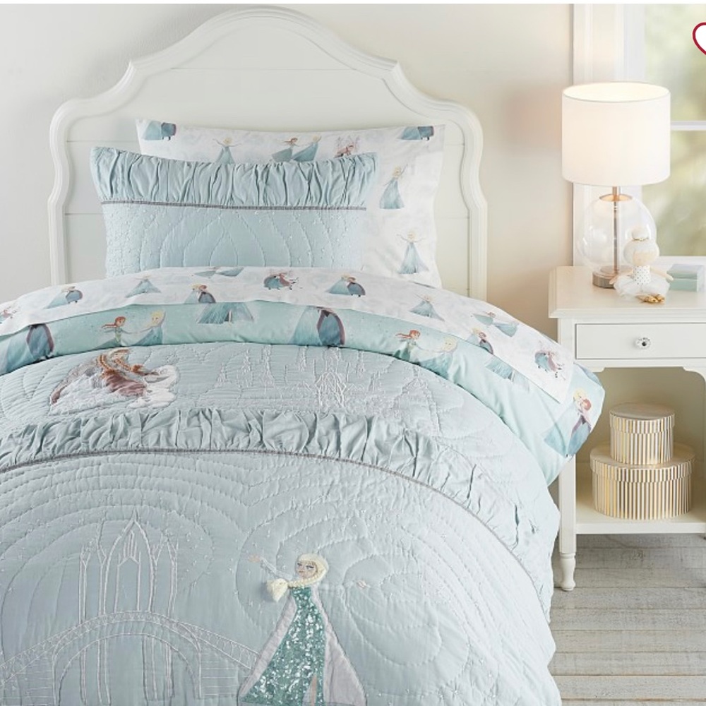 Pottery barn frozen queen bedding set. Includes two pillow cases and quilt.